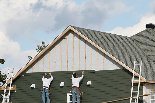 Professional Siding Contractor technician working in Ivor, VA